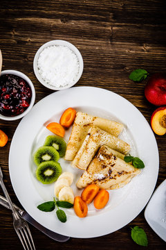 Crepes with fruits and creme 