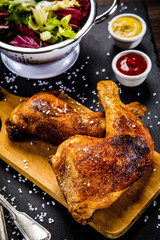 Roast chicken legs with and vegetables