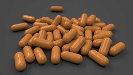Pile of orange medicine capsules