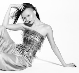 Black and white fashion portrait of a young woman in a stylish manner. Avant-garde hairstyle....