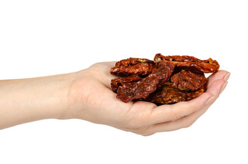 Sun dried red tomatoes with hand isolated on white background