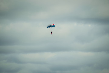 Naklejka na ściany i meble Skydiver on the sky