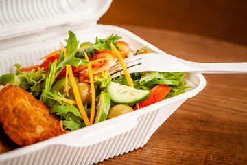 Concept of vegetarian and healthy eating. Cutlets from peas, salad, ogretsami, tomatoes, olives and...