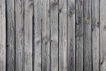 Texture of dark untreated wood, Old wooden laths background, Weathered larch background - obrazy, fototapety, plakaty