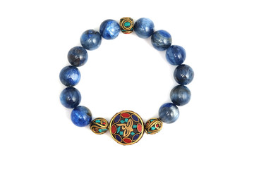 Kyanite or Cyanite blue lucky stone bracelet bead decorate with Chakra amulet accessories on white isolated background
