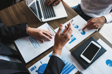 business colleagues discussing on documents data, executives meeting