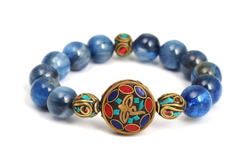 Kyanite or Cyanite lucky stone bracelet bead decorate with Chakra amulet accessories on white...