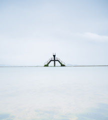 Swimming pool by the sea, long exposure