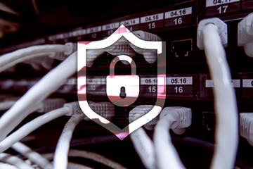 Cyber protection shield icon on server room background. Information Security and virus detection.