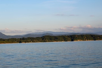 The beautiful lake in the mountains on a sunny evening.