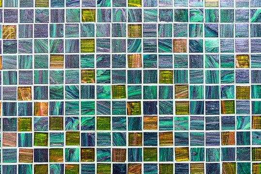Background from some glittering turquoise mosaic tiles