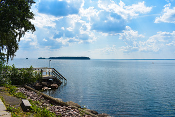 Fototapeta na wymiar Lake Pyhäjärvi is a large lake found in Finland. This view is seen from the veranda of Katismaa Island KR Ky in Säkylä, Finland.