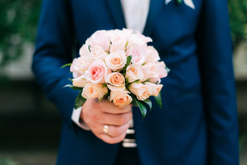 Groom with a bouquet