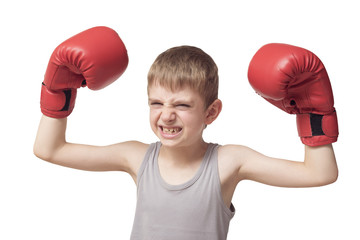 Angry boy in red boxing gloves. Isolated