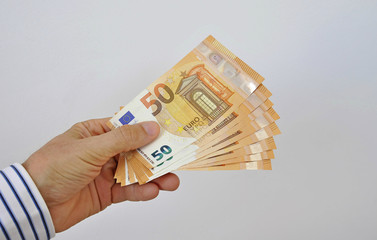 paper money fifty euros in hand