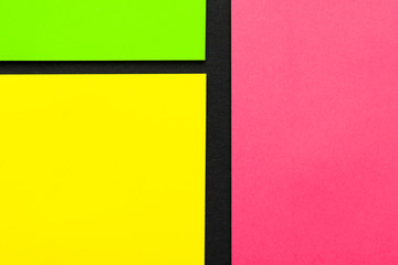 Small square sheets for notes. Yellow, green, pink paper.