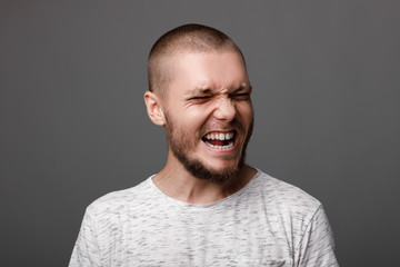 the portrait of the young bearded man