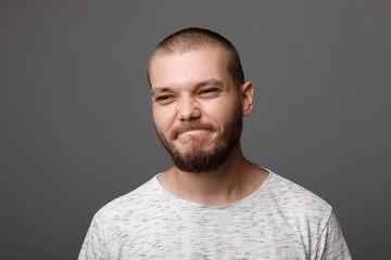 the portrait of the young bearded man