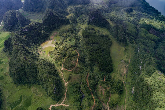 Aerial view of Karst mountains and rice fields