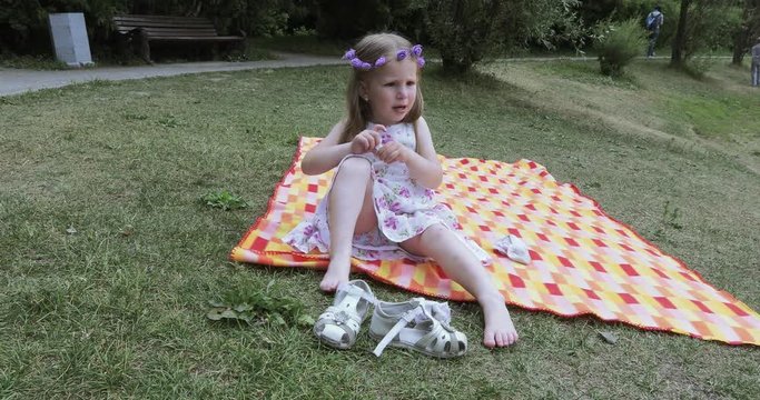 Girl child on a picnic