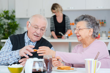 old couple having a nice breakfast