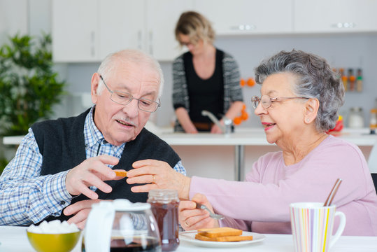 old couple having a nice breakfast - Powered by Adobe