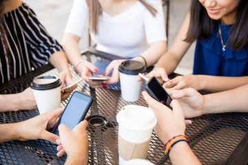 Friends hanging out at coffee shop