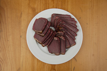 Smoked dried meat as appetizer