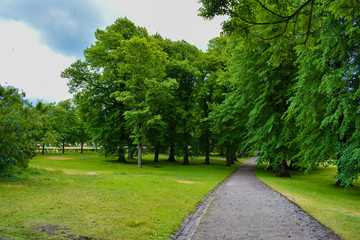 Park and pathway outside a church in Suomenlinna, Helsinki, Finland