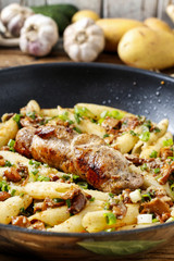 Baked pork chop with penne pasta