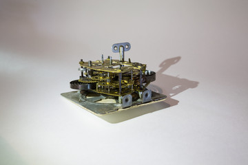  Disassembled mechanical clock, cogs and gears. 