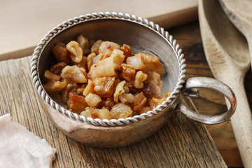 Fatback and pork greaves (pork rinds)
