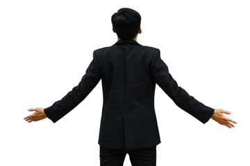 Rear view of a businessman stretching his arms out.