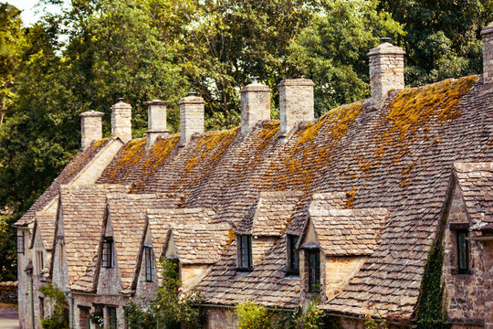 Medieval Cotswold stone cottages of Arlington Row in the village of Bibury, England