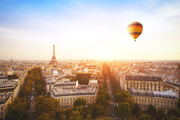 dream travel destination, beautiful panoramic view of Paris with Eiffel Tower and flying hot air balloon, France
