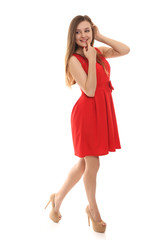 beautiful blonde in a red dress on a white background