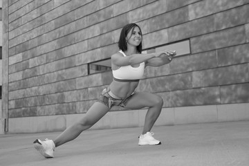 sports girl is training on the street