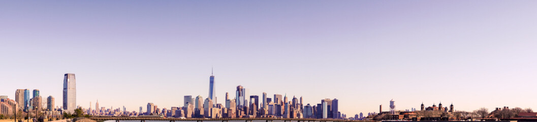 New York  City Skyline Panorama with colorful sky at sunset