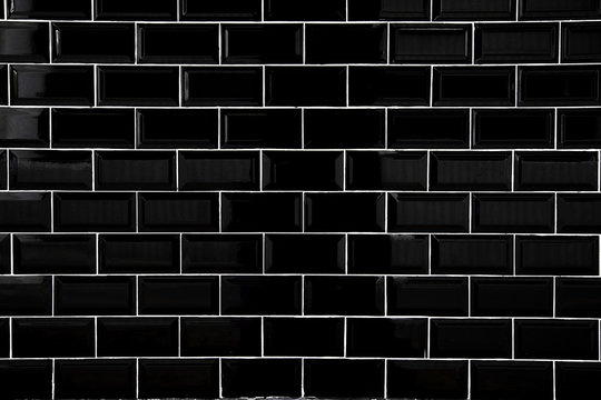 Black ceramic tiles, Wallpaper and background concept.