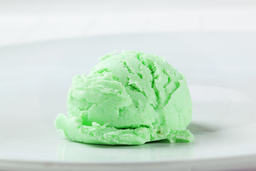 Scoop of green ice cream