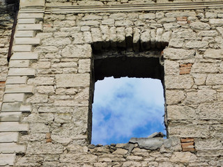 Blue sky in the window of the historic wall