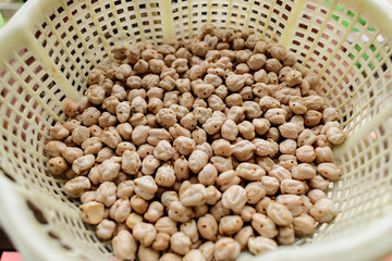 Obraz premium Basket Full Of Edible Legumes Called Lentils
