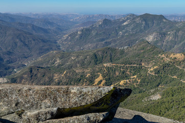 view of Generals Highway, Peaks Ridge, Kaweah river and San Joaquin valley from Moro Rock trail...