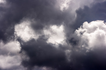 storm cloud on sunny day