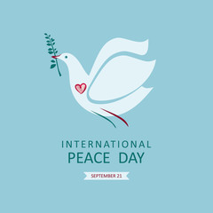 Fototapeta na wymiar International Peace Day. Dove with an olive branch in its beak against the sky.