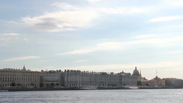 Floating on a boat on Neva river St. Petersburg.Dome of St. Isaac's Cathedral.The Hermitage building.