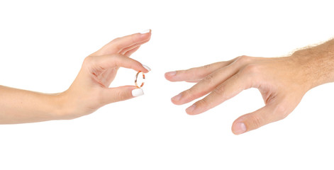Wedding rings two hands on a white background