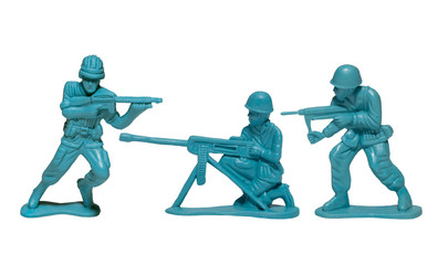 macro plastic toy soldiers with guns on white background