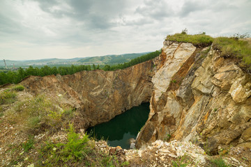 Giant failure, on the site of anthropogenic disaster. The Failure of Tuim is a technogenic failure...