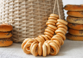 Russian traditional bakery food sushki and baranki background with straw background